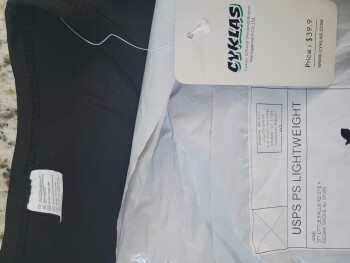 Unordered black tee shirt photo #1