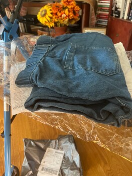 تقرير سلامة المستهلك An order I did not place. I received a pair of jeans, that I did not order. I would like to report i... صورة فوتوغرافية #1