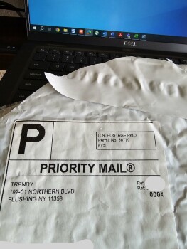 I am reporting an unordered package. Was this replacement scam? photo #1