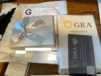 Unsolicited fake diamond ring delived to our address via USPS from "seller" photo #1