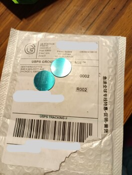 A package has two little metal pieces 照片 #1