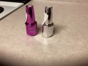 I received 2 bottles of polish, that I didn’t order photo #1
