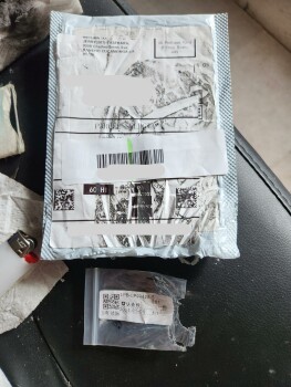 I received a package. Somebody had already taken the Content out of. 照片 #1