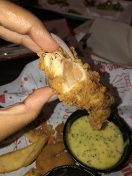 Consumer Food Safety Report Red Robin, USA I went  last night and they fucking gave me RAW chicken. The manager gon ask do I wan... photo #1