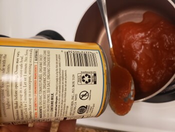 Consumer Food Safety Report H-E-B, 7015 Village Center Drive, Austin, TX, USA Black specks in cans of Amy's tomato soup. Is this... photo #1