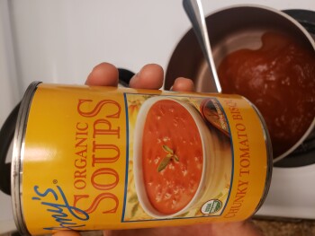 Consumer Food Safety Report H-E-B, 7015 Village Center Drive, Austin, TX, USA Black specks in cans of Amy's tomato soup. Is this... photo #3