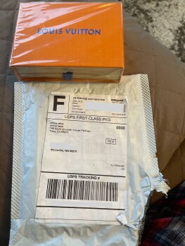 A package with a fake Louis Vuitton credit card - 188 south mountain house parkway photo #1