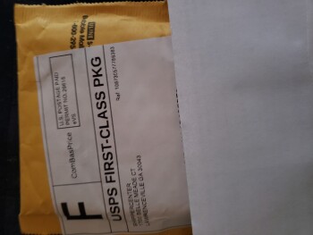 Empty postal envelope delivered photo #1