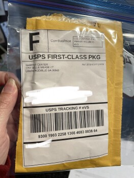 Empty Manilla envelope switched for my package Foto #1