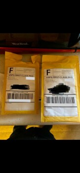 Receiving two empty yellow bubble envelopes in the mail addressed to me. صورة فوتوغرافية #1