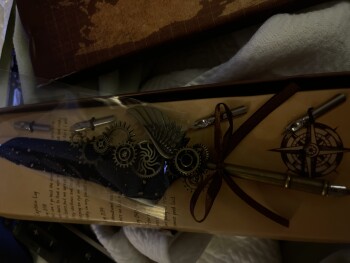 Receiving a package with a 1502 world map series feather pin I did not order photo #1