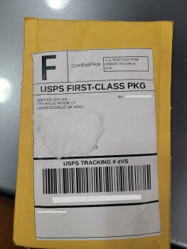 A brown bubble mailer that wasn't ordered and was empty upon receipt. photo #1