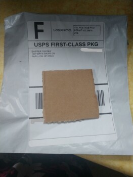 Unknown PKG with just a piece of cardboard sent photo #1
