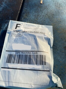 I received a package from Shipper with a piece of cardboard in it photo #1