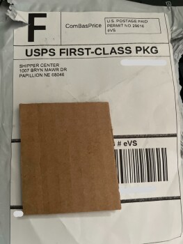 Received package with small piece of cardboard photo #1