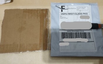 I received a small piece of cardboard foto #1