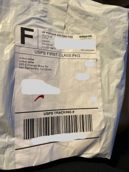 I received an unordered black piece of material with two draw strings. photo #1