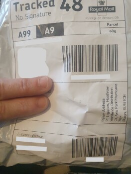 消费者安全报告 A parcel I recieved didn't order Recieved a scarf/shawl from PFT Logistics, sent by a Michael Nick.... 照片 #2