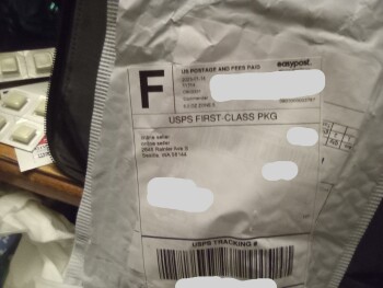 Received two packages from this same address 1 pair of Ray-Ban sunglasses and a package of socks photo #1