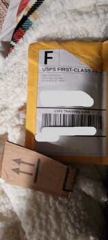 Received a small piece of cardboard in the mail address to my correct name. photo #1