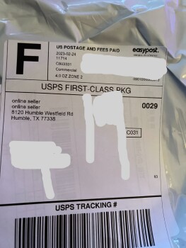 I am reporting an order I did not place. It’s a silk scarf with horses on it. photo #1