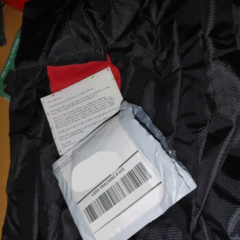 Received a small package in the email with a piece of cloth photo #1