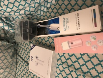 Unordered ears plugs,ZVS ZRMR toothbrush, some kind of watch, and a Nano mist sprayer photo #1