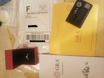 My wife received a ring today after ordering some clothes from one wholesale but didn't get any clothes photo #1