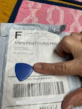 Got a package I didn’t order ,Guitar pick photo #1