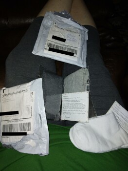 I received two packages of socks that I did not order صورة فوتوغرافية #1
