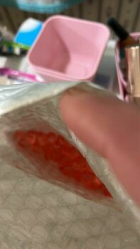 I am received an envelope weird with kinda soft gel pink / light orange colors photo #1