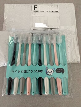 Consumer Safety Report Items that I never order I received a pack of 10 toothbrushes and a red cloth in the mail today I ne... photo #2