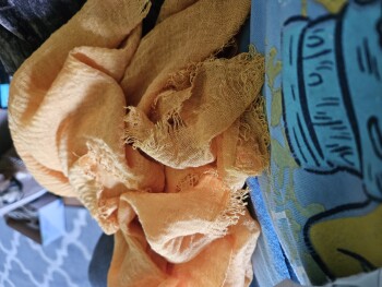 A scarf I did not order I ordered a rocking chair was charged 39.955 صورة فوتوغرافية #1