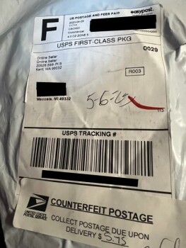package delivered with counterfeit postage due photo #1