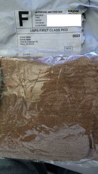 I have received 2 scarves that I did not order. photo #1