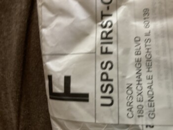 I am reporting unordered package a strip of material with a saying on it. 照片 #1