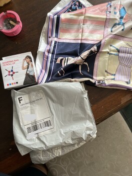 Not getting what I ordered and got a horse scarf and a shopping bag to roll up photo #1