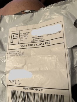 Received envelope with a piece of pressed wood photo #1