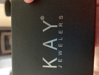 Consumer Safety Report I received a small package that I did not order.  It was a silver ring with fake diamonds in a Kay J... photo #1