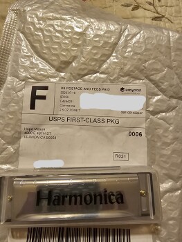 消费者安全报告 Scam Alert I am reporting a package I received after ordering from HSN. I received a harmonica that... 照片 #2