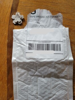 Consumer Safety Report A scam I ordered rocking chairs with side table attached and I got a small flower key chain worth ab... photo #1