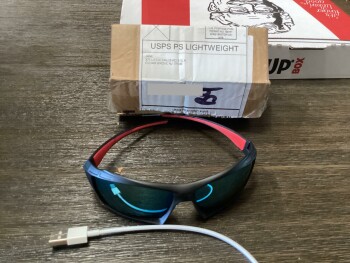 Consumer Safety Report Unordered package Received a package that I did not order..a pair of sunglasses and a small charging... photo #1