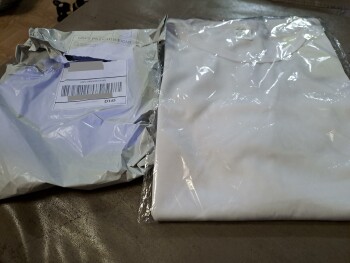 تقرير سلامة المستهلك I received a package i never ordered from Jane I received a package with a white shirt of some kind. صورة فوتوغرافية #2