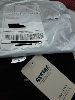 تقرير سلامة المستهلك I got a package from Jane It is a black shirt, size medium, tag - cyklas official (finland) brand ma... صورة فوتوغرافية #1
