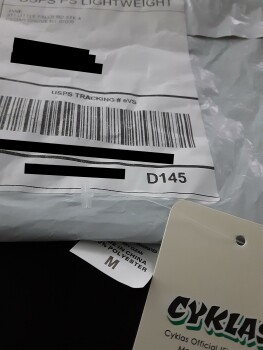 تقرير سلامة المستهلك I got a package from Jane It is a black shirt, size medium, tag - cyklas official (finland) brand ma... صورة فوتوغرافية #2