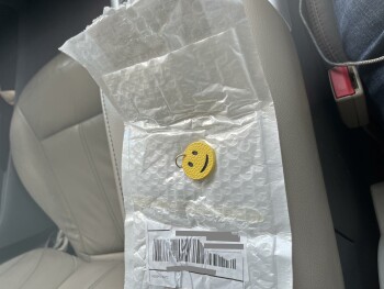 Received a smiley face keychain from Carrie Bonkiewicz photo #2