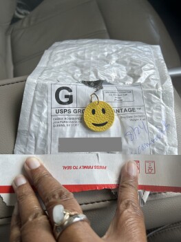Received a smiley face keychain from Carrie Bonkiewicz photo #1