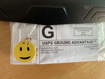 I am a scam of which I received a smiley face ring instead of a camera (Canon). photo #1