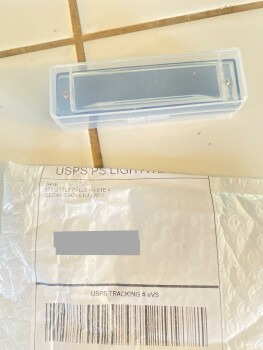 An harmonica from Jane. I did not order. I do not want. Why did I get this? photo #1