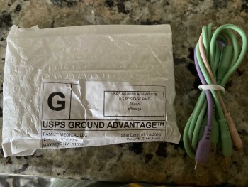 I received a package in the mail from you with a charging cord in it, I did not order it 照片 #1